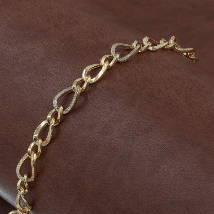 Turkish Bracelet in Gold Color Made of Sterling Silver with Interlocking Curved Rings Design