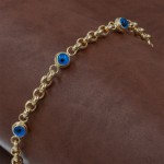 Sterling Silver Bracelet in Gold Plated with Interlocking Links Design with Three Evil Eye Balls