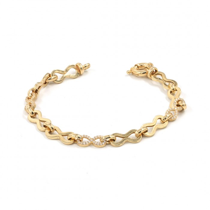 Gold-tone Silver Bracelet with Engraved Infinity Design and Geometric Zircon Stones