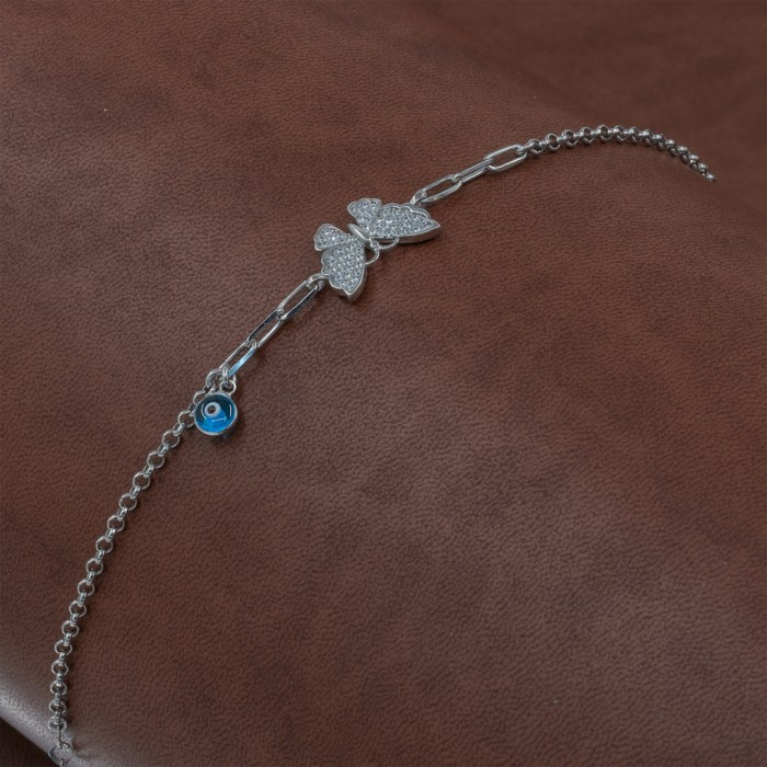 Sterling Silver Bracelet with Butterfly and Evil Eye Design