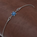 Sterling Silver Bracelet Decorated with Blue Zircon Stone Flower