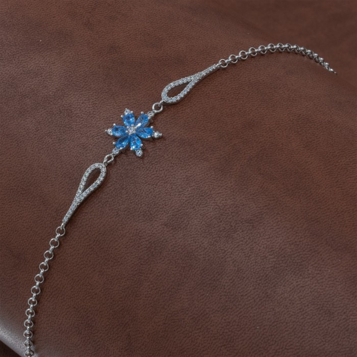 Sterling Silver Bracelet Decorated with Blue Zircon Stone Flower